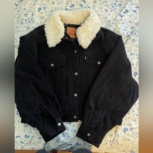 Black with white trim Levi’s sherpa